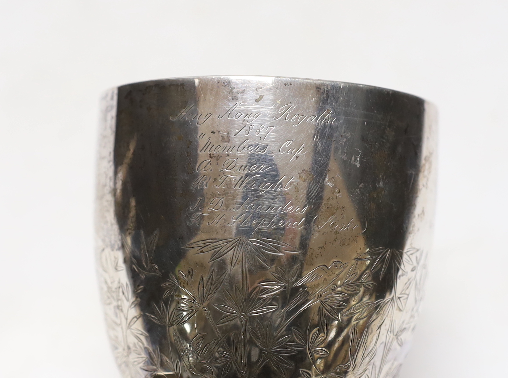 A late 19th century Chinese sterling presentation 'Hong Kong Regatta' rowing trophy goblet, with crossed oar supports and engraved inscription dated 1887, 18.4cm, 7.5oz.